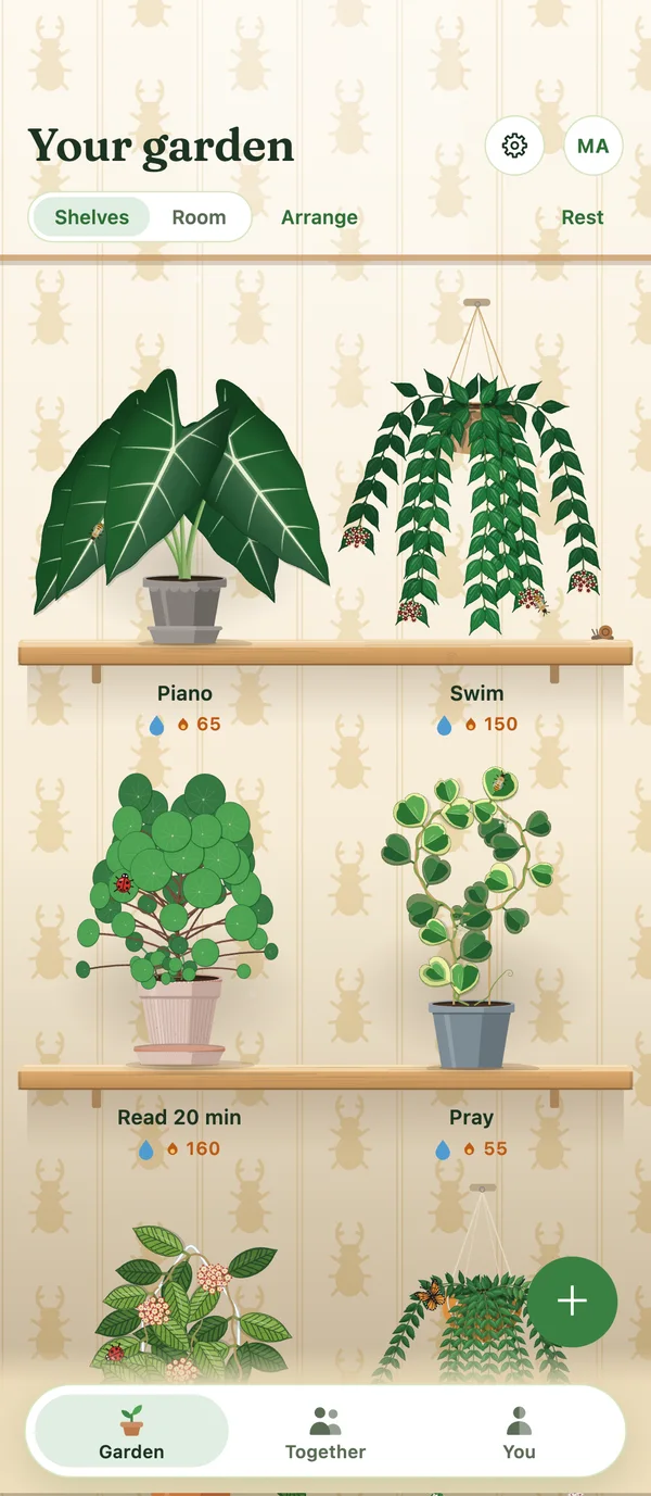 The app on a phone: Your garden, four plants on two shelves, one for each habit, with the habit and its streak under each.